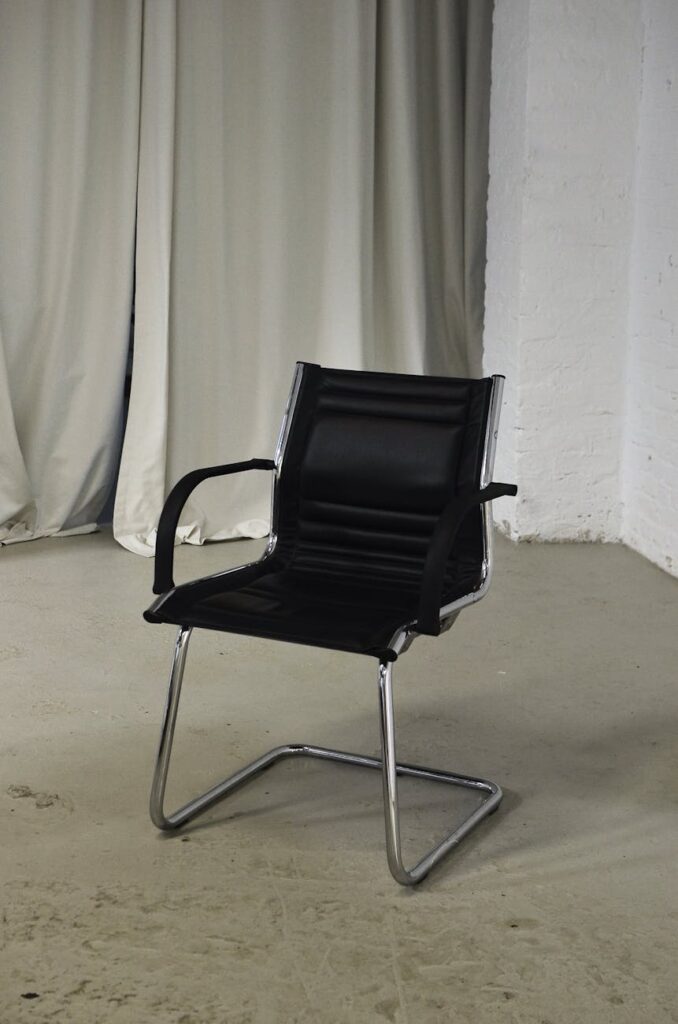empty black chair in room