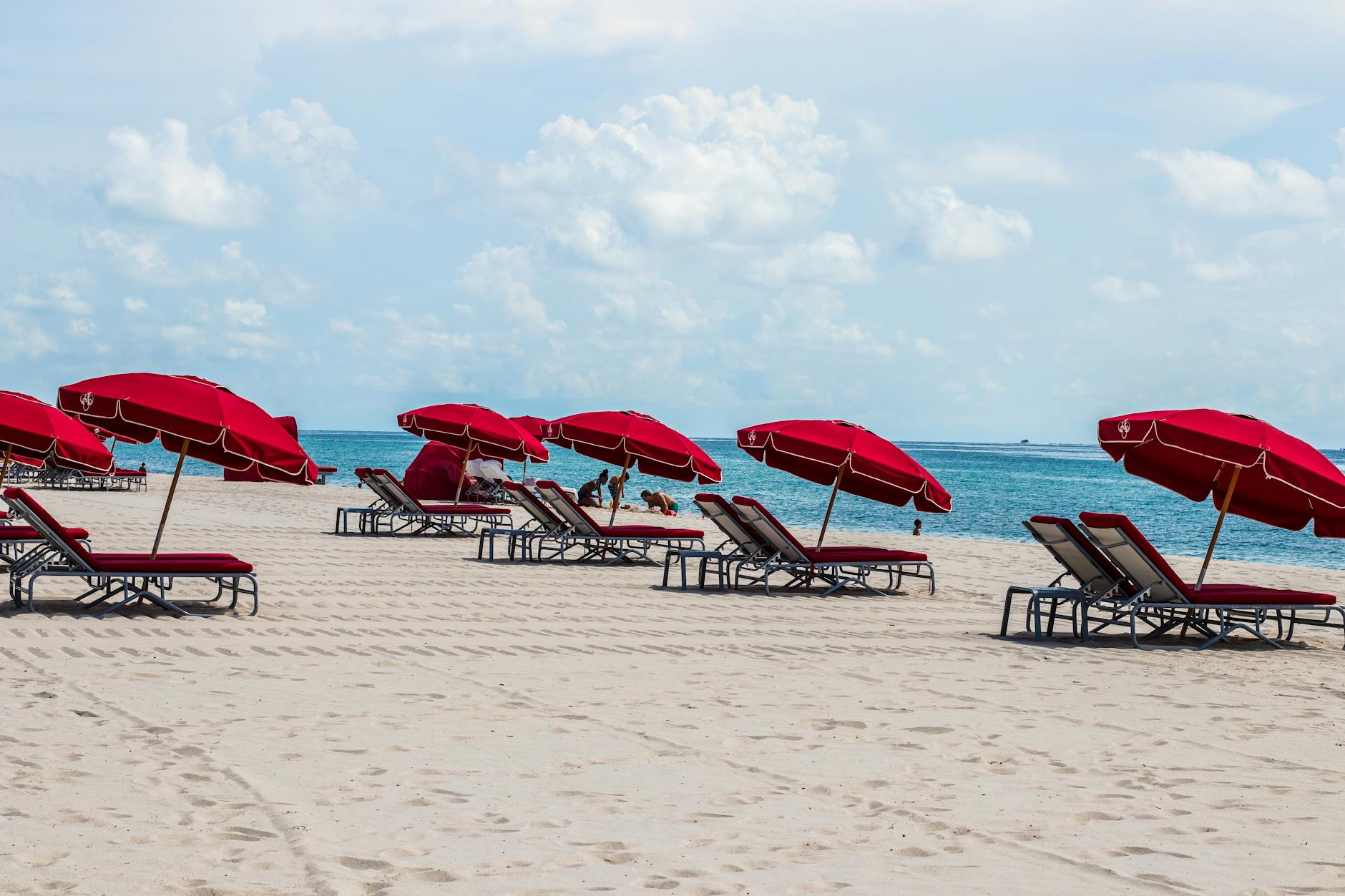 deckchairs and umbrellas on a sandy beach